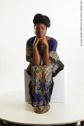 Dina Moses African Woman Sitting Pose